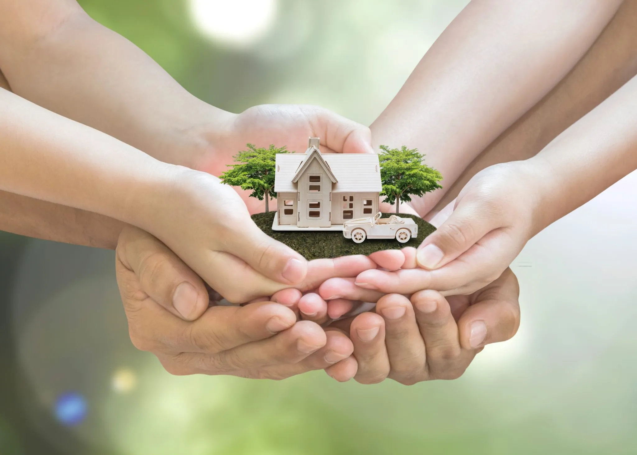 imgi_1_iStock-958039576-2048x1463 hands holding miniature house